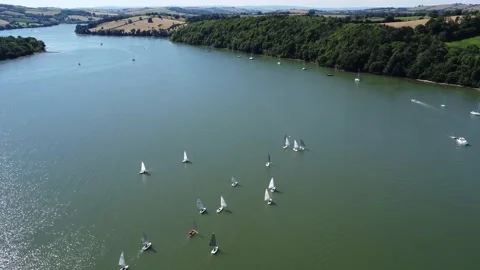 River Dart, South Devon, England: Drone View: Wayfarer training yachts sailing Stock Footage 201207571