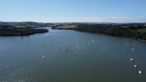 River Dart, South Devon, England: Drone View: Wayfarer training yachts sailing Stock Footage 201207696