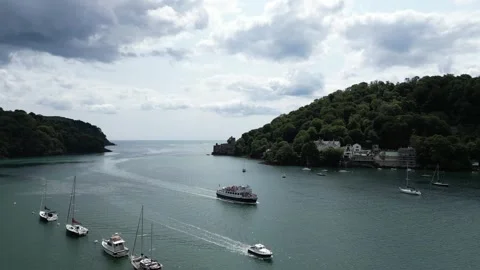 River Dart, South Devon, England: DRONE VIEWS: Dartmouth Castle &amp; Tourist Boats Stock Footage 244934445