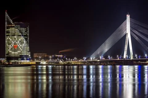 River Daugava, cable bridge and angel 写真素材