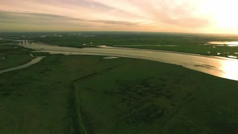 River Delta at Sunrise Panning Drone Shot Stock Footage 196090435