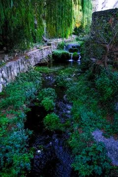 River descends between walls Stock Photos