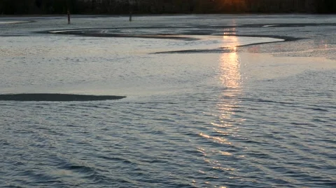 River dock with sun beaming through river at Rocky point park Stock Footage 64546442