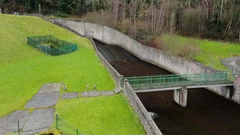 The river dodder running under a bridge at Rathmines and Rathgar Waterworks. Stock Footage 171170736