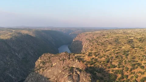 River (Douro) forms the border between Spain and Portugal in a canyon. Aerial Stock Footage 326915702