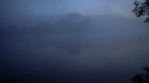 River is drawn in by white mist at dawn. Stock Footage 108557513