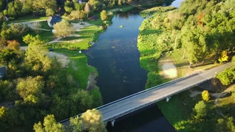 River drone flight over a bridge in the countryside Stock Footage 163016321