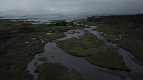 River by drone that leads to a lake Stock Footage 167337174