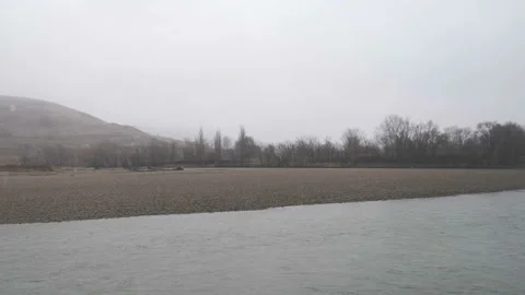 River in early winter during the snowfall Stock Footage 170447266
