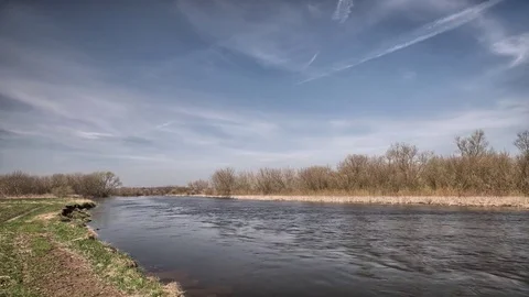  River in eastern Europe, clouds moving in the sky.  Stock-Footage 74759310