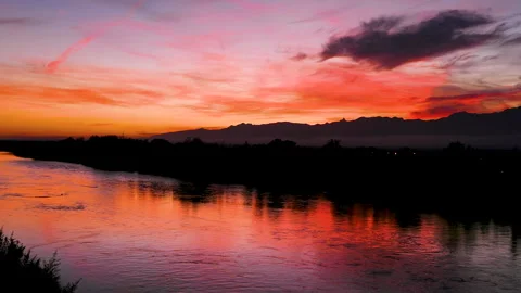 The river Ebro as it passes through the province of Tarragona, Catalonia, Spain. Stock Footage 256980784