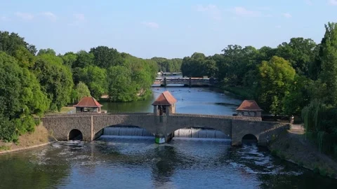 River Elster weir, bridge in Leipzig summer. Stunning aerial view flight drone Stock Footage 283820842