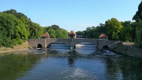 River Elster weir, bridge in Leipzig summer. Beautiful aerial view flight drone Video stock 283820980