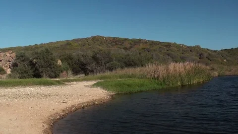 River, ending on a Coast Stock Footage 76381220
