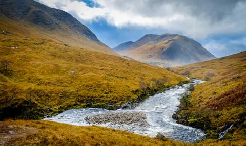 The river Etive in speight as it flows through Glen Etive, Scotland Stock Photos