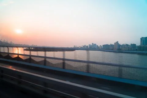 River in the evening in the big city Stock Photos