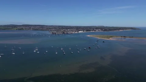 River Exe, Devon, England: DRONE VIEWS: River Exe, Dawlish Warren &amp; Exmouth (2) Stock Footage 265261658