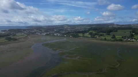 River Exe, South Devon, England: DRONE VIEWS: River Exe estuary and marshlands Stock Footage 247826268