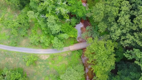 River Explore View of Pedestrian Bridge (drone) Stock Footage 248938592