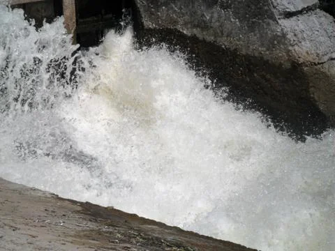 River fast stream close-up, dark water, white foam, Poltava, Ukraine Stock Photos