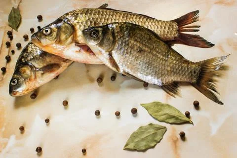 River fish with spices in its raw form Stock-Fotos