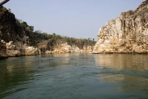 River Flanked by Rocks at Bedaghat Stock Photos