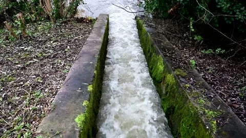 River flood relief sluice during winter flooding Stock Footage 145528072