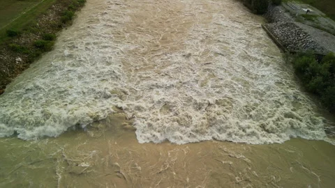River flooding during storm surge and heavy rainfall due to climate change Stock Footage 255886964