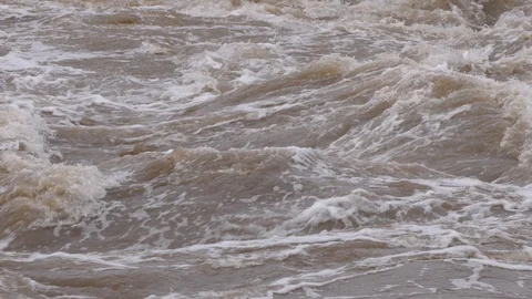 River flooding it's banks during spring thaw and snow melting season Stock Footage 86225113