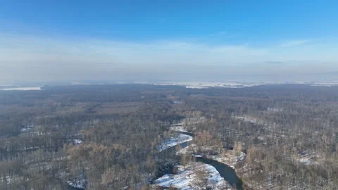 River floodplain delta winter snow meander drone aerial inland video shot in Stock Footage 264152728
