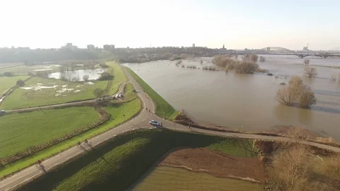 River floods overflow in the Netherlands at the dikes Stock Footage 85892141