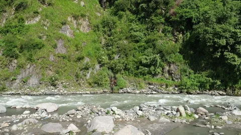 A river flow along side greenary in Kashmir, India Stock-Footage 247113998