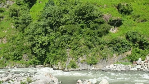 A river flow along side greenary in Kashmir, India Stock-Footage 247115455