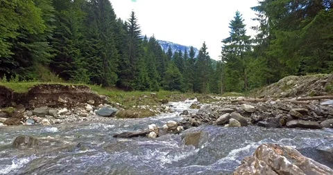 River flow on cloudy day Stock Footage 102722603