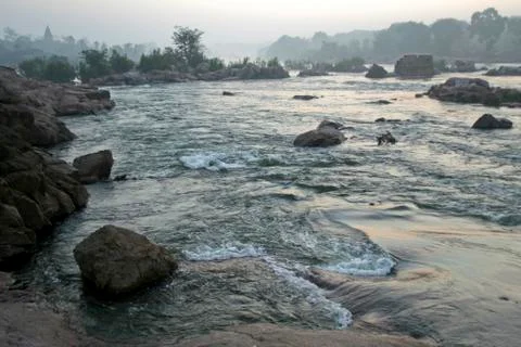 River Flow at Dawn Stock Photos