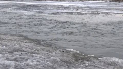 River flow, ice banks, April in Siberia Stock Footage 75336206