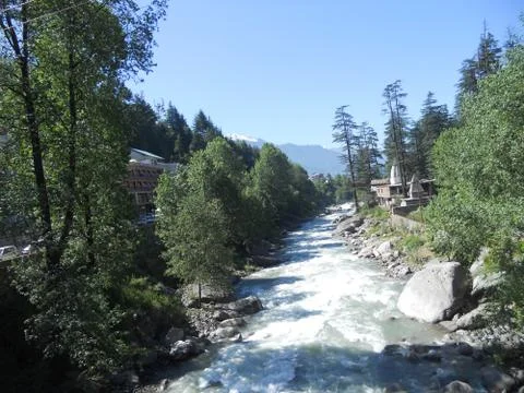 River flow inside the town Stock Photos