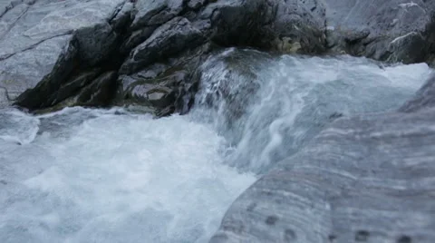 River flow in mountains slowmotion Stock Footage 57763805