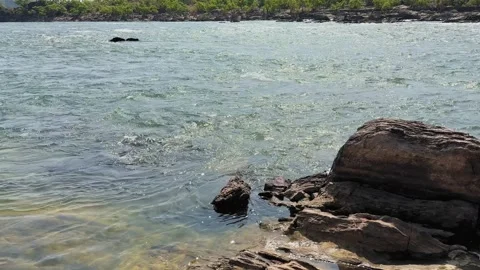 River Flow Revealing Garbage Pollution 스톡 동영상 331033867