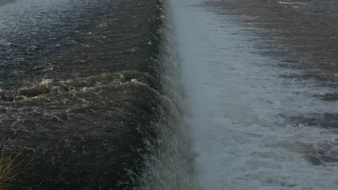 River Flow Rubber Dam 4K Stock Footage 308718794