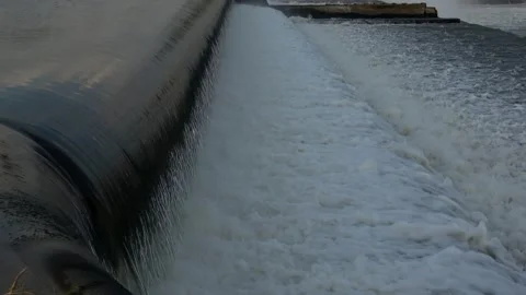 River Flow Rubber Dam 4K Stock Footage 308722199