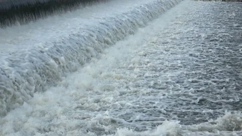 River Flow Rubber Dam 4K Stock Footage 308723067