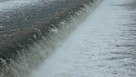 River Flow Rubber Dam 4K Stock Footage 308723168