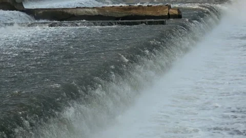 River Flow Rubber Dam 4K Stock Footage 308723171