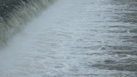 River Flow Rubber Dam 4K Stock Footage 308724472