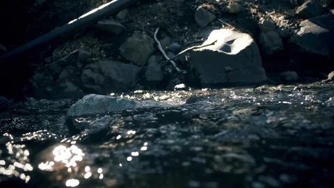 River flow slow motion 60 ftps into 24 Stock Footage 97443006