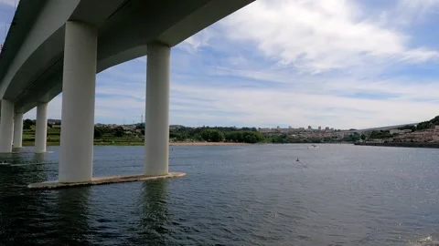 River Flow Under the Bridge in Porto, Portugal Stock Footage 278218617