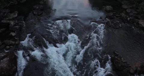 River flow view from a bridge in the evening Stock Footage 312466132