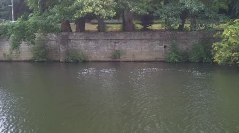 River Flowing Against A Stone Wall 動画素材 8562523