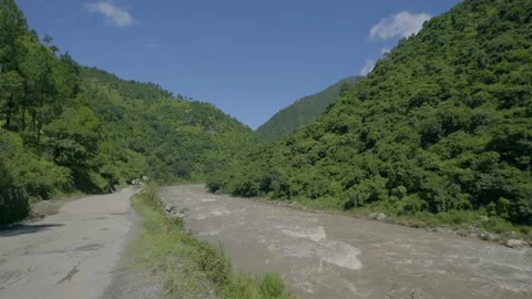 River flowing along the raod Stock Footage 201839840